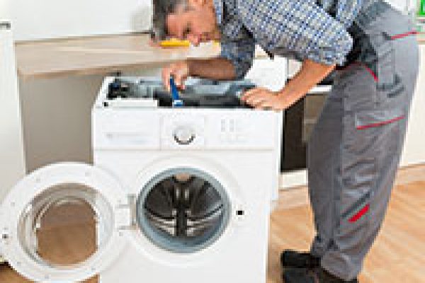Technician-Repairing-Washing-Machine